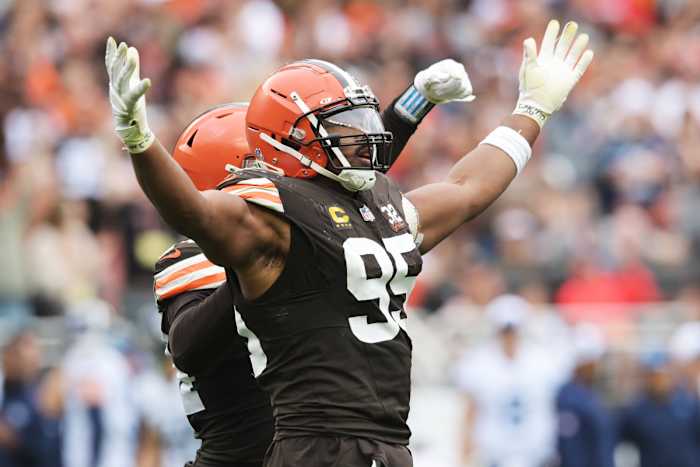 Sep 24, 2023; Cleveland, Ohio, USA; Cleveland Browns defensive end Myles Garrett (95) celebrates after sacking Tennessee Titans quarterback Ryan Tannehill (not pictured) during the second half at Cleveland Browns Stadium.